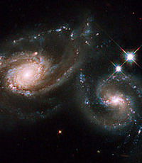 Телескоп Хаббл представил фото сливающихся галактик