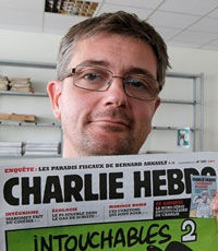 В Париже раскуплен весь тираж нового номера Charlie Hebdo