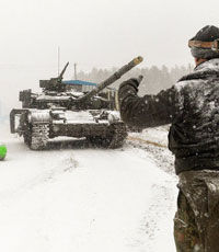 Киев начнет отвод тяжелой техники при соблюдении перемирия в течение двух суток