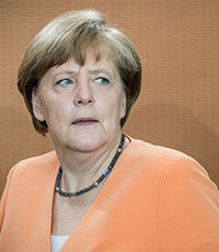 Меркель: Германия не будет менять миграционную политику