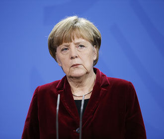 Меркель призвала Порошенко сделать решающий шаг в реализации "Минска-2"