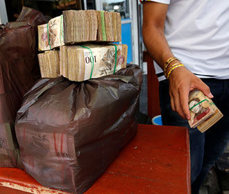 Венесуэльские деньги потеряют пять нолей и привяжутся к криптовалюте
