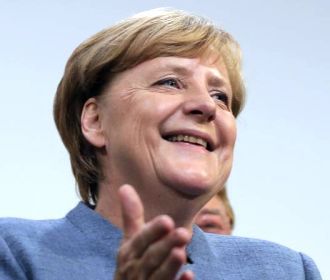 Порошенко и Меркель договорились продолжить консультации на уровне глав МИД "Нормандского формата"