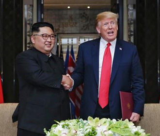 Трамп и Ким Чен Ын могут встретиться перед выборами в США - Болтон