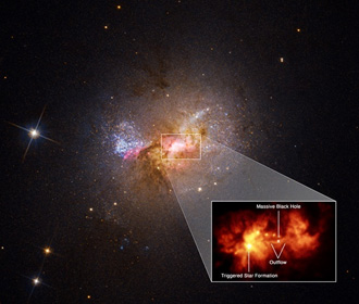 Hubble запечатлел черную дыру, которая создает звезды