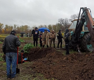 На Харьковщине обнаружили братскую могилу украинских солдат