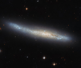Телескоп Hubble зафиксировал спиральную галактику в созвездии Девы